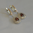 Срібні сережки з накладками з золота