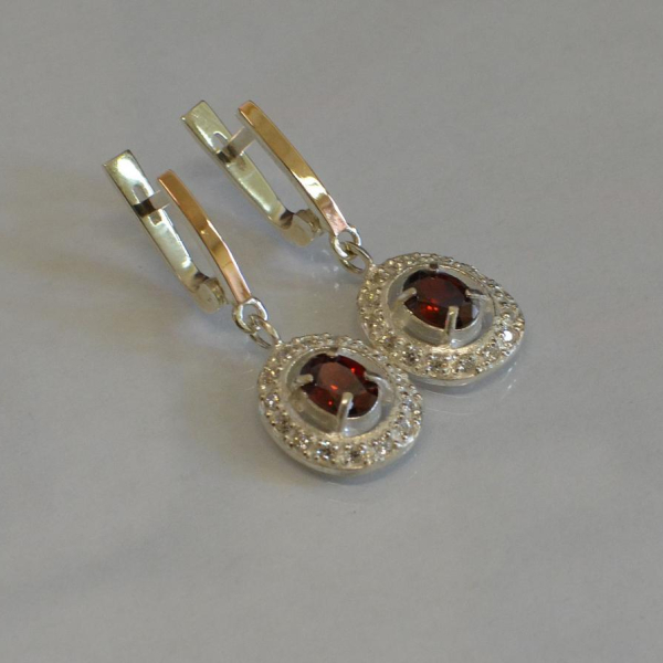 Срібні сережки з накладками з золота