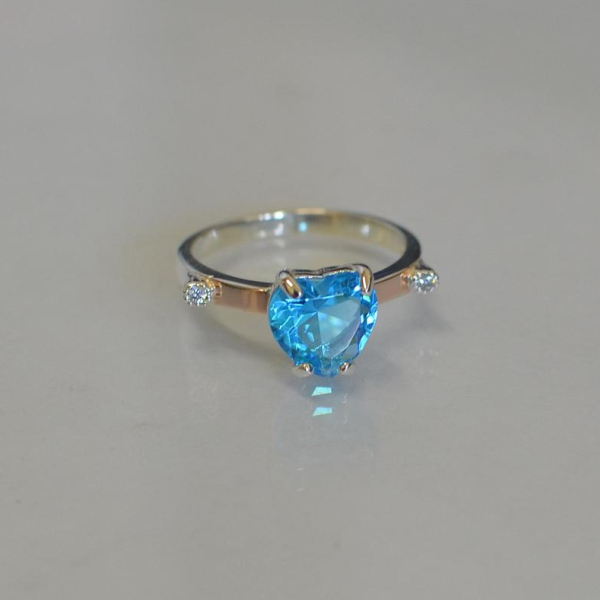 Срібна каблучка з золотими напайками