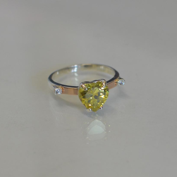 Срібна каблучка з золотими напайками