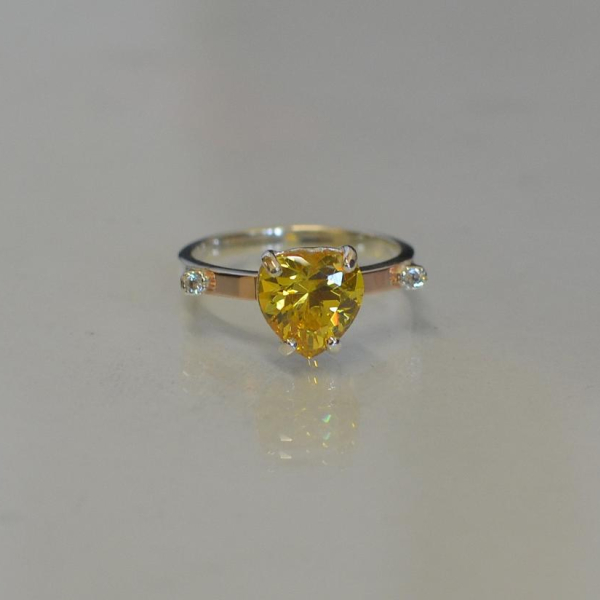 Срібна каблучка з золотими напайками