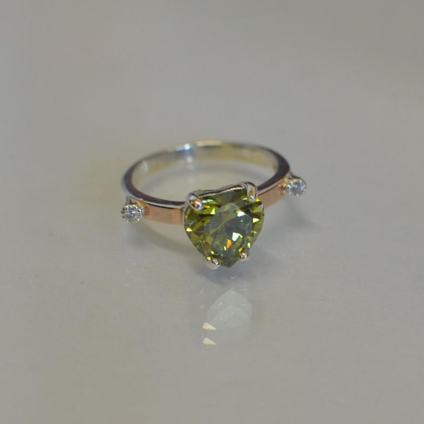 Срібна каблучка з золотими напайками