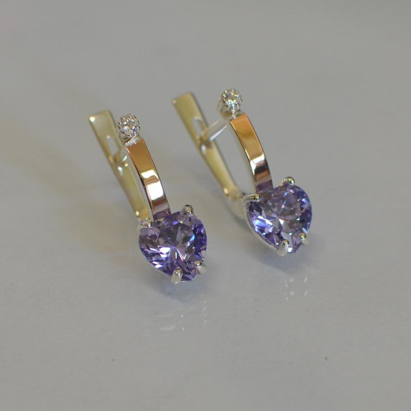 Срібні сережки з золотими напайками