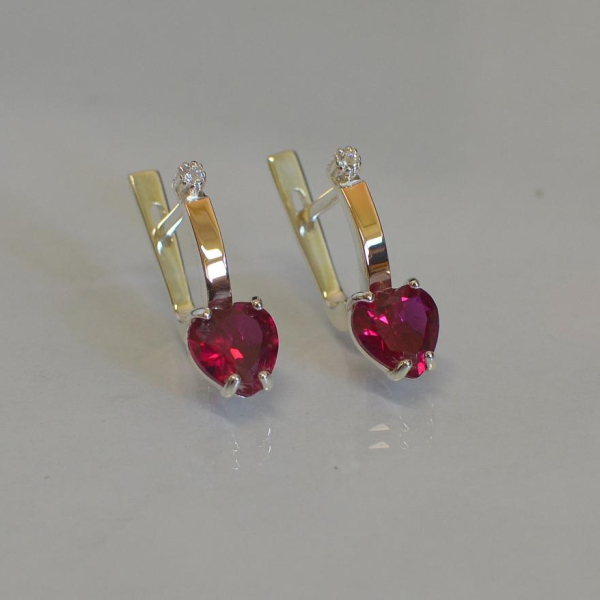 Срібні сережки з золотими напайками