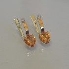 Срібні сережки з золотими напайками