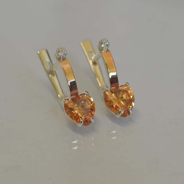 Срібні сережки з золотими напайками