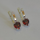 Срібні сережки з золотими напайками