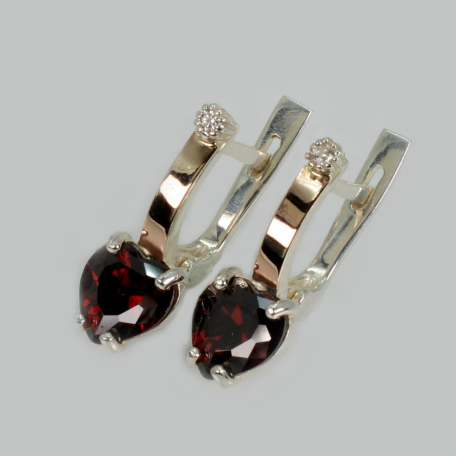 Срібні сережки з золотими напайками