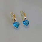 Срібні сережки з золотими напайками