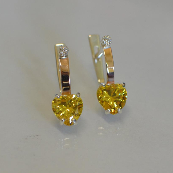 Срібні сережки з золотими напайками