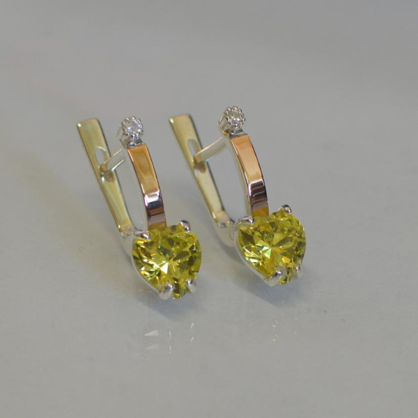 Срібні сережки з золотими напайками