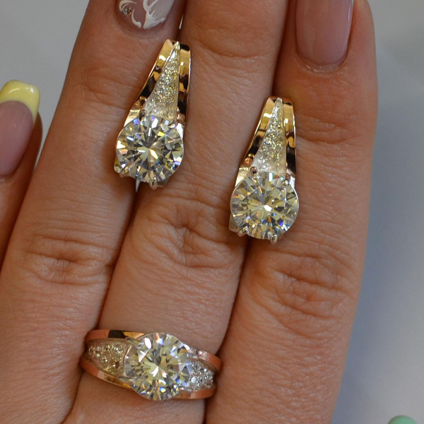 Срібний комплект з золотими пластинами