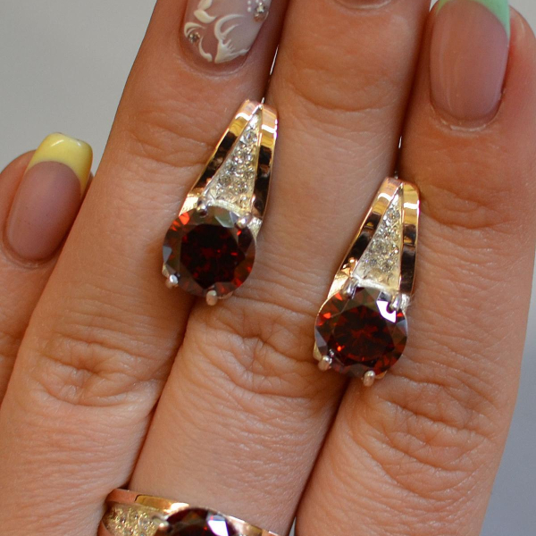 Срібний комплект з золотими пластинами