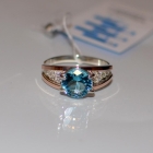 Срібна каблучка з золотими пластинами