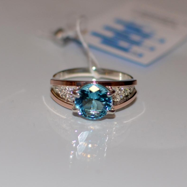 Срібна каблучка з золотими пластинами