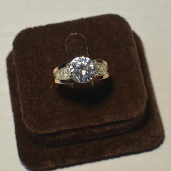 Срібна каблучка з золотими пластинами