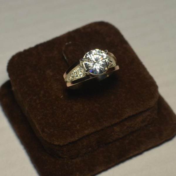 Срібна каблучка з золотими пластинами