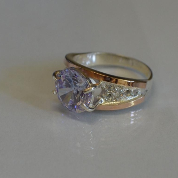 Срібна каблучка з золотими пластинами