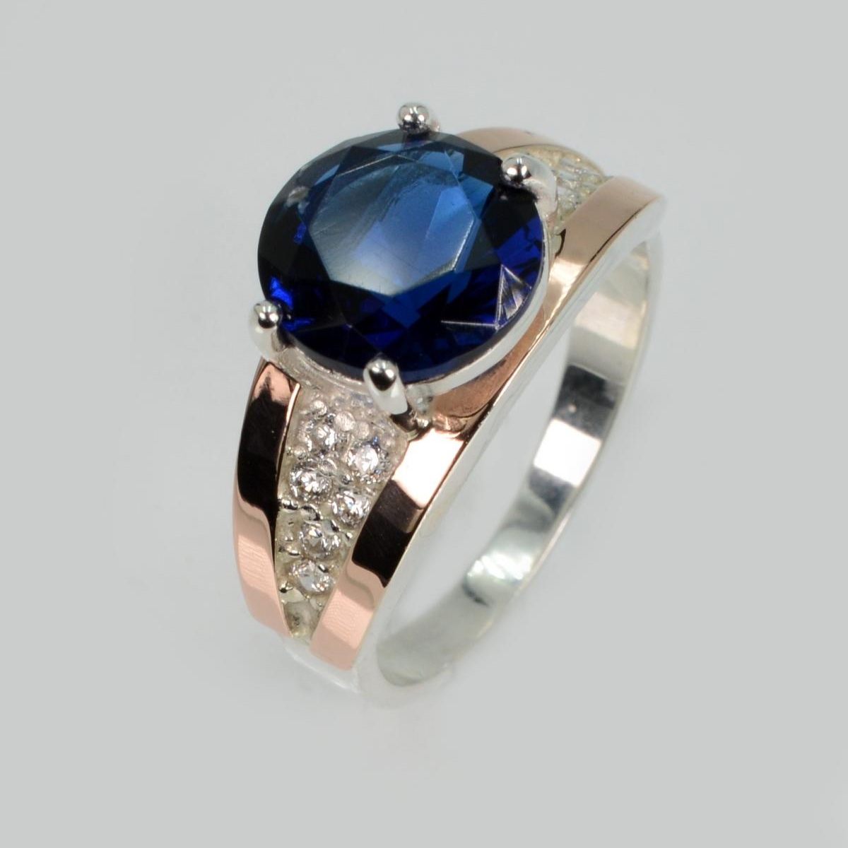 Срібна каблучка з золотими пластинами