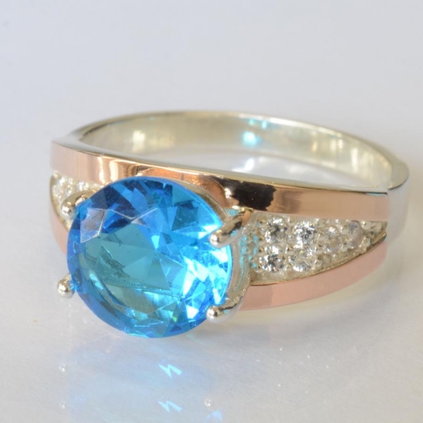 Срібна каблучка з золотими пластинами