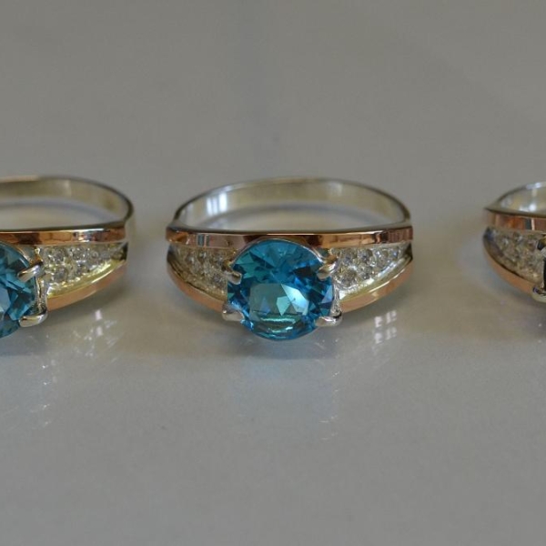 Срібна каблучка з золотими пластинами