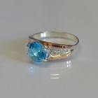 Срібна каблучка з золотими пластинами