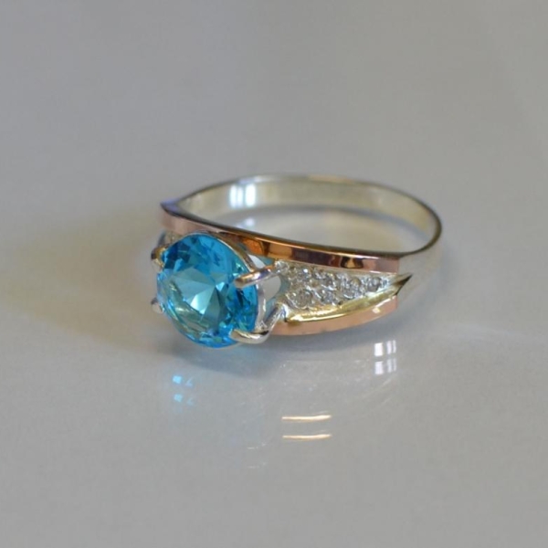 Срібна каблучка з золотими пластинами