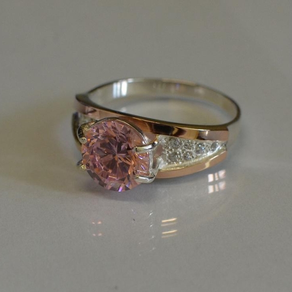 Срібна каблучка з золотими пластинами