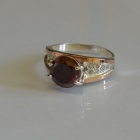 Срібна каблучка з золотими пластинами