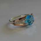 Срібна каблучка з золотими пластинами