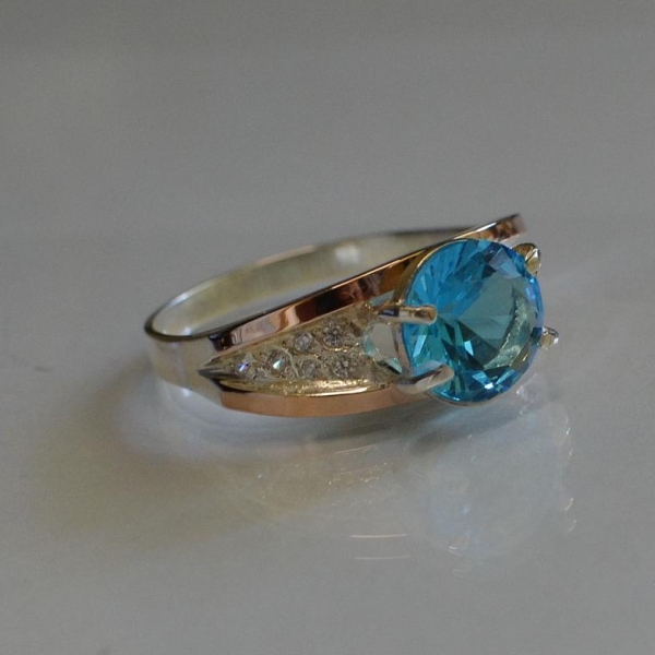 Срібна каблучка з золотими пластинами