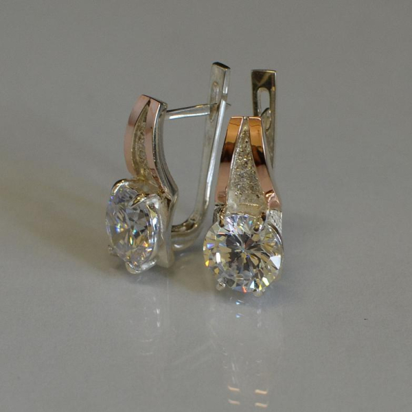 Срібні сережки з золотими вставками