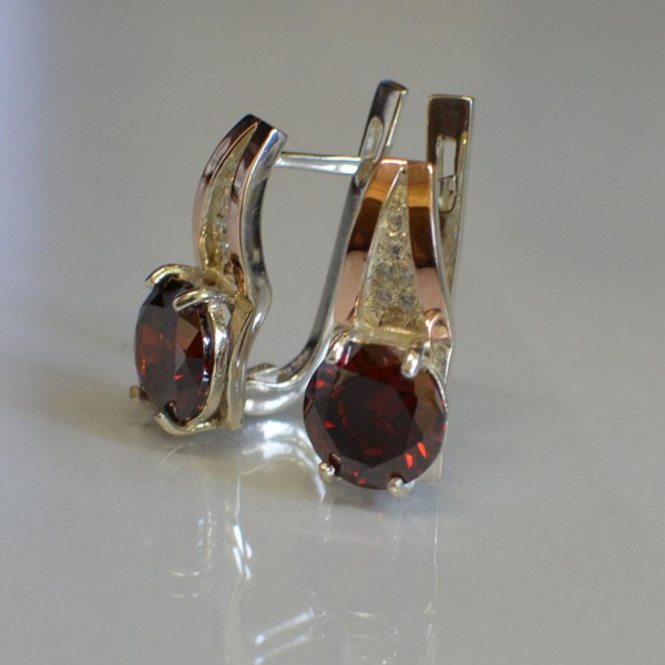 Срібні сережки з золотими вставками