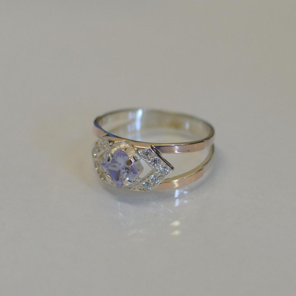 Срібна каблучка з золотими напайками