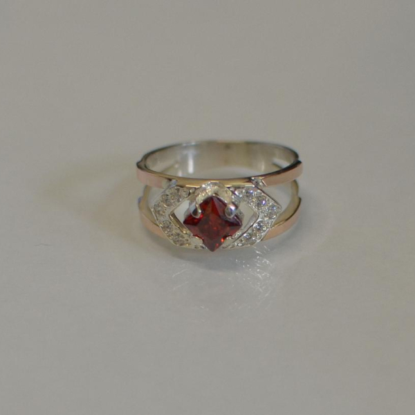 Срібна каблучка з золотими напайками