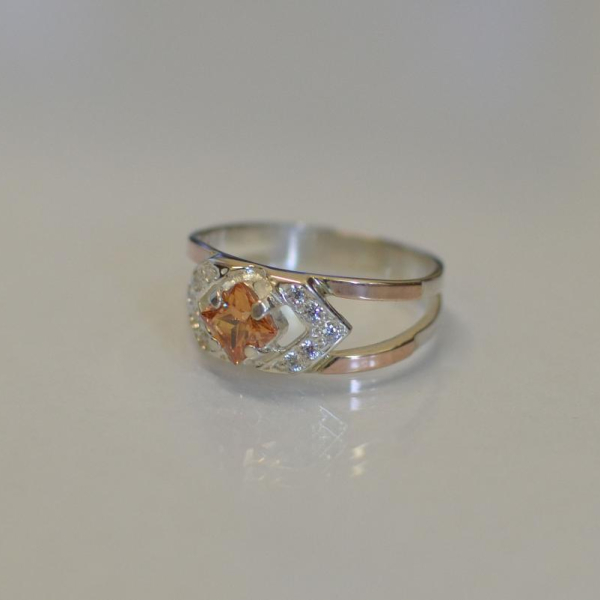 Срібна каблучка з золотими напайками