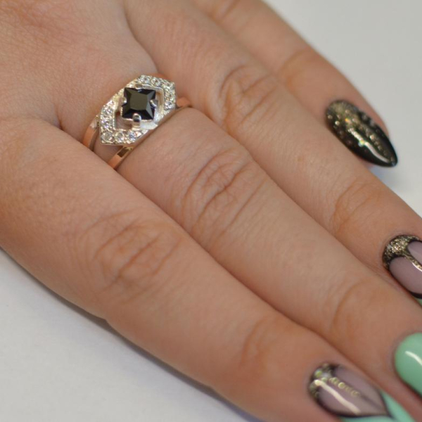 Срібна каблучка з золотими напайками