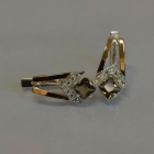 Срібні сережки з золотими пластинами