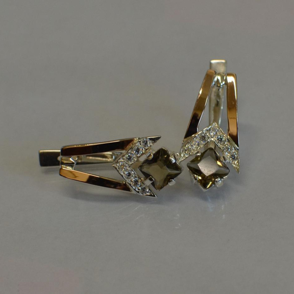 Срібні сережки з золотими пластинами