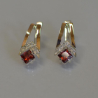 Срібні сережки з золотими пластинами