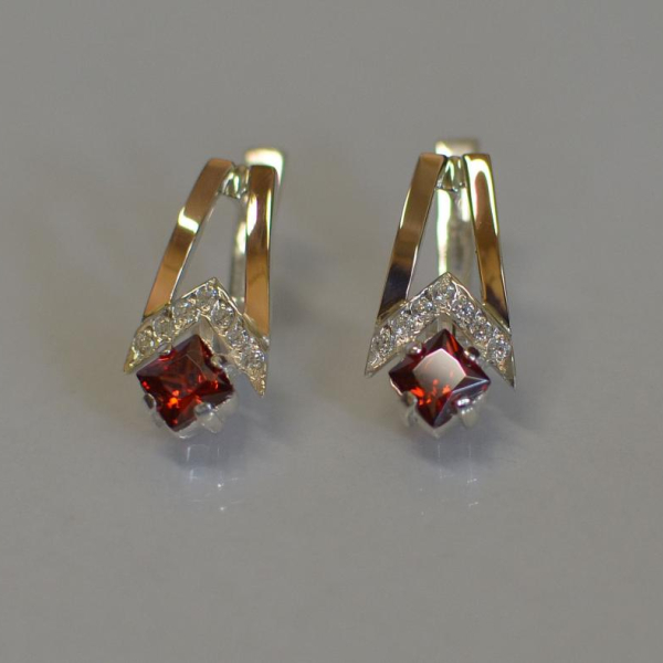 Срібні сережки з золотими пластинами