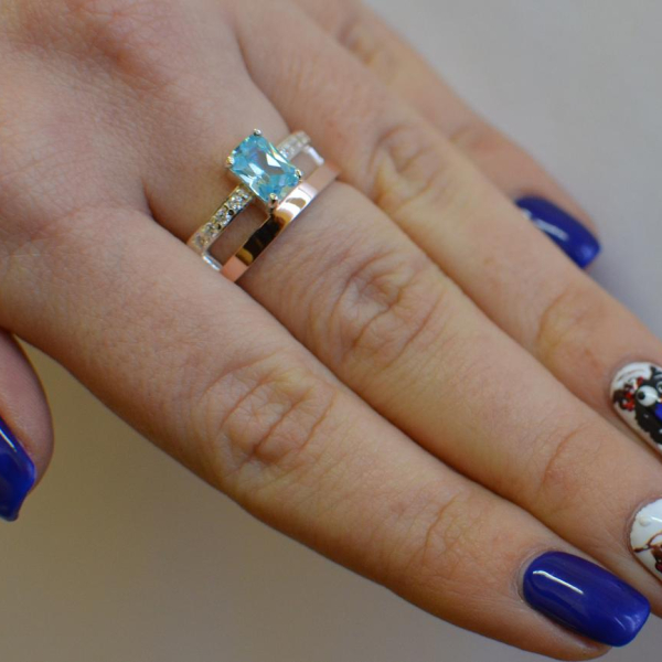 Срібна каблучка з накладками з золота