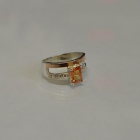 Срібна каблучка з накладками з золота