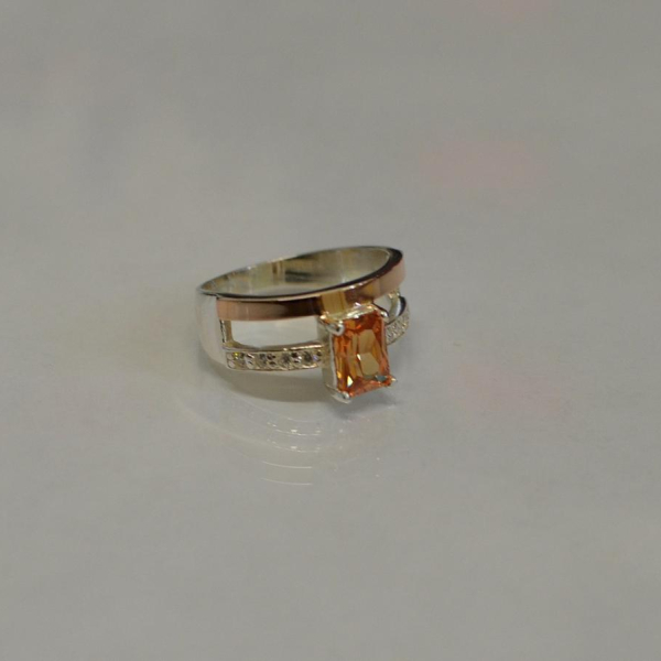 Срібна каблучка з накладками з золота