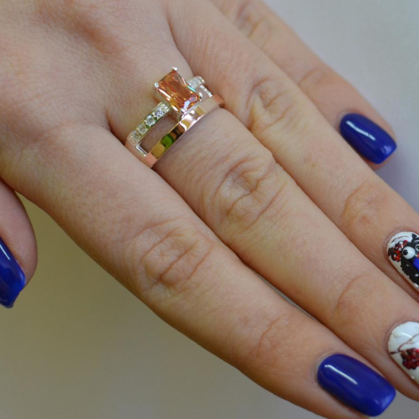 Срібна каблучка з накладками з золота