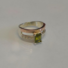 Срібна каблучка з накладками з золота