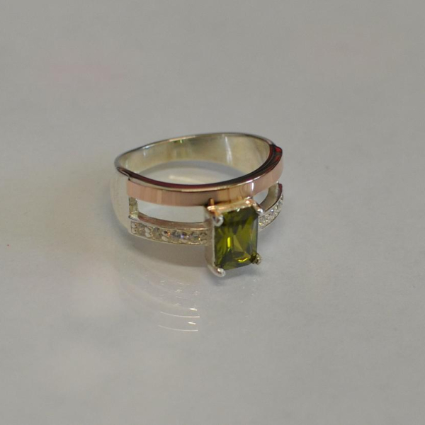 Срібна каблучка з накладками з золота