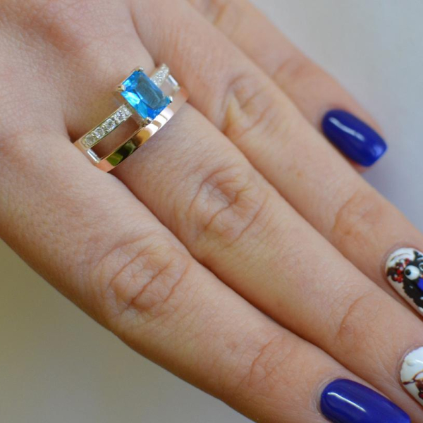 Срібна каблучка з накладками з золота