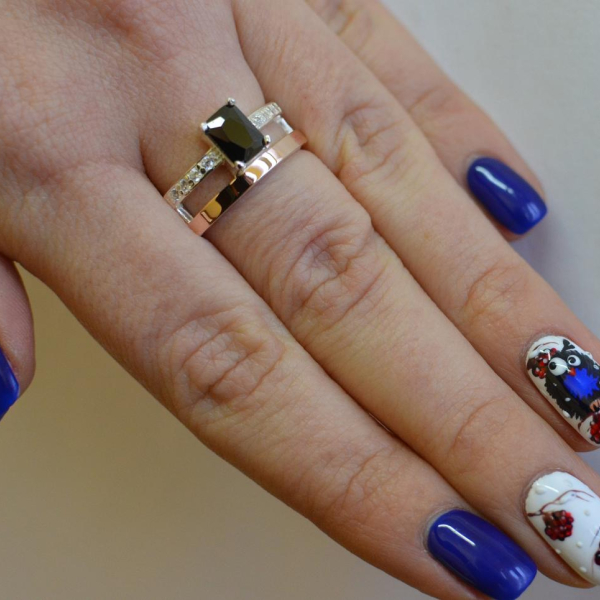 Срібна каблучка з накладками з золота