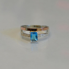 Срібна каблучка з накладками з золота